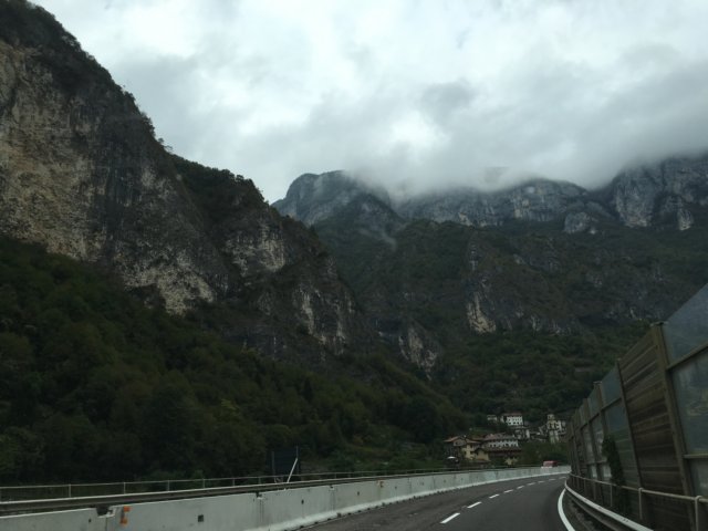 thedolomitealpsloomoverthehighway.jpg